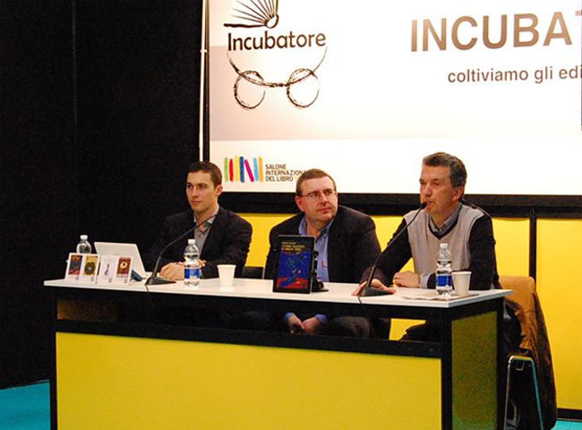 Gianluca Turconi (al centro) al Salone Internazionale del Libro di Torino 2013